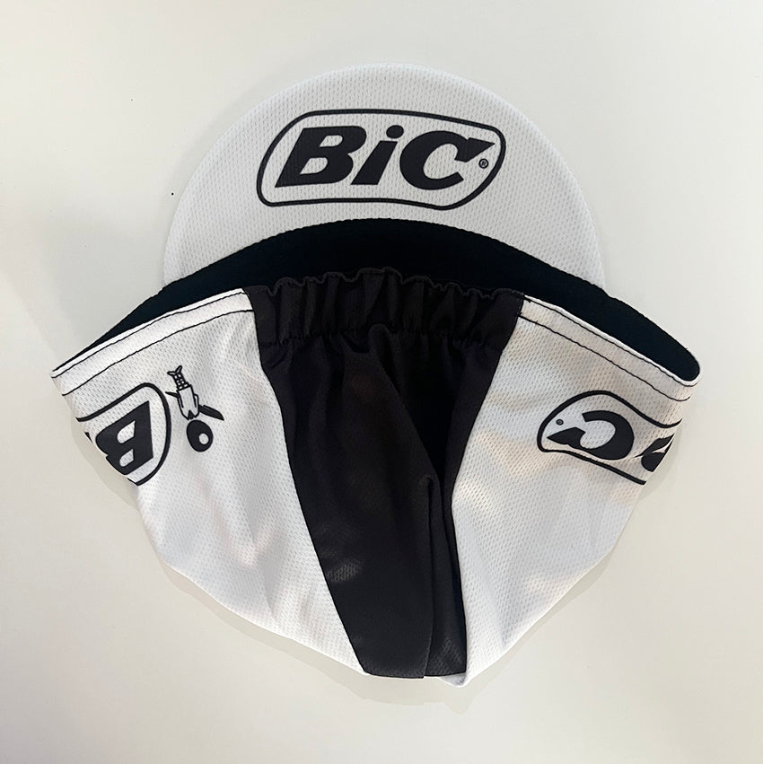 BIC retro cycling cap top view, white with black panel and BIC logo