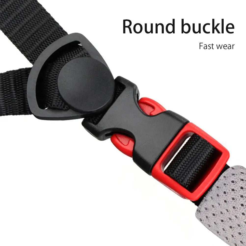 Close-up of the red and black cycling helmet buckle and strap adjuster