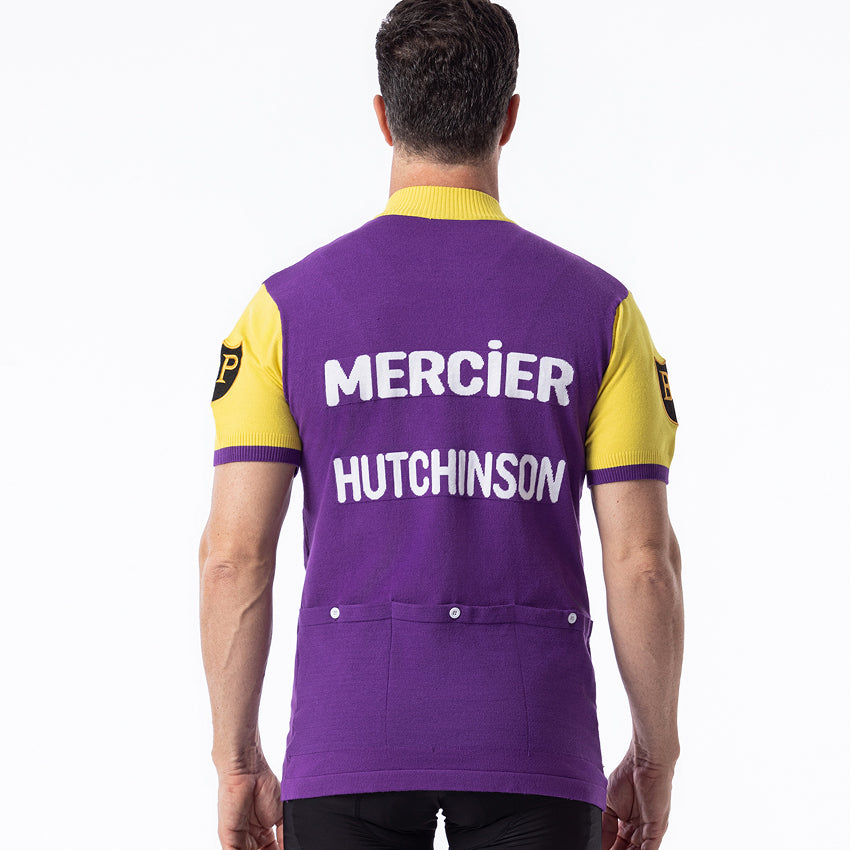 Man wearing Mercier Hutchinson wool cycling jersey back view